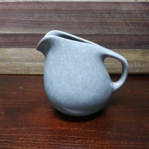 Small pottery creamer